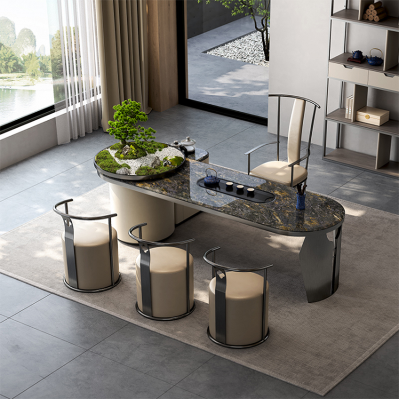 How does the height and size of the tea table affect the user experience and living room layout?
