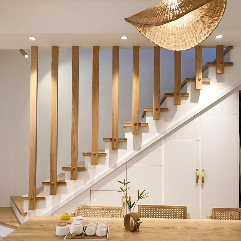 How can stair cabinets cleverly utilize the dead space beneath stairs to maximize storage capacity?