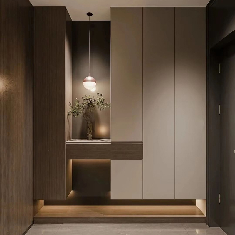 How can entryway cabinets enhance the first impression and daily routine upon entering a home through clever design?